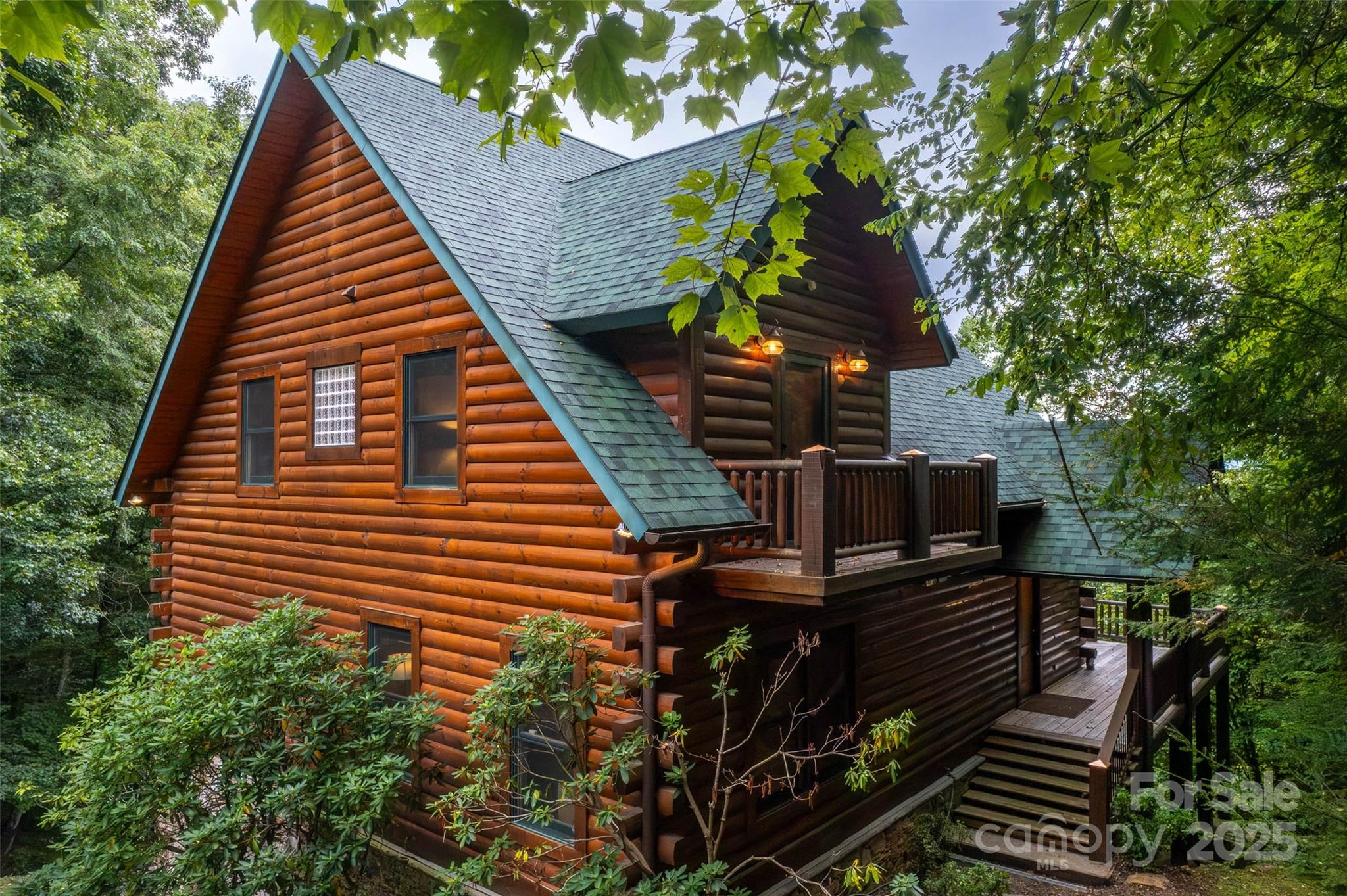 776 Still Branch Road Sylva, NC 28779 - Photo 6 of 43 a view of a house with wooden deck
