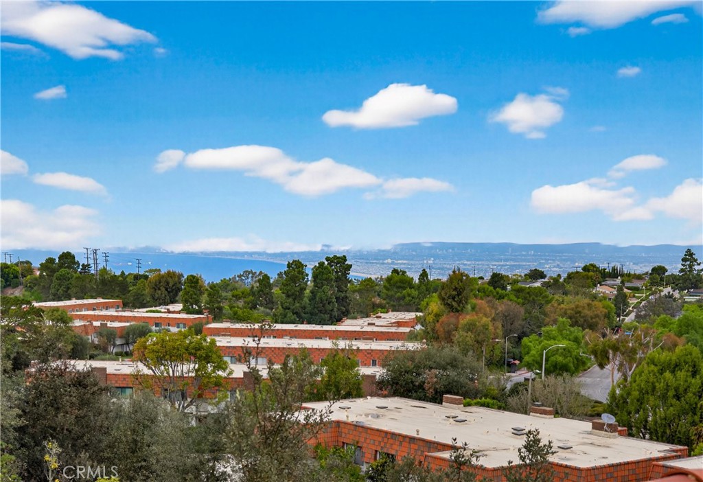 28109 Highridge Road, Unit 21 Rancho Palos Verdes, CA 90275 - Photo 1 of 1 a view of a lake with a mountain