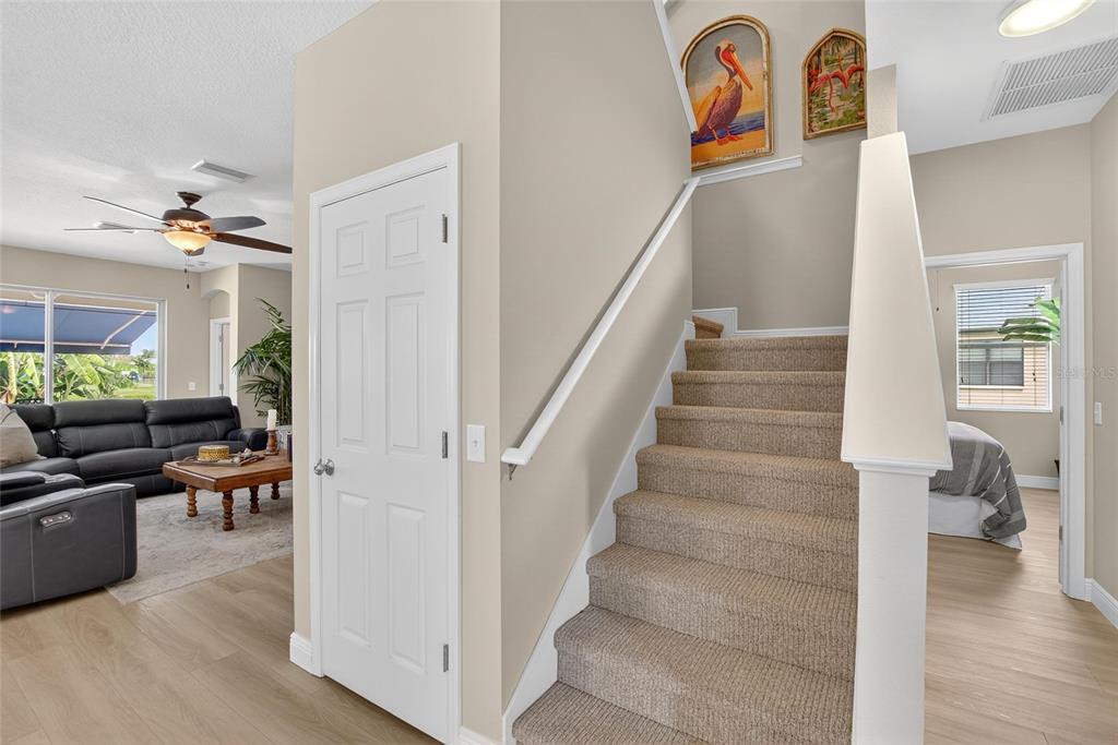 306 Hope Bay Loop Apollo Beach, FL 33572 - Photo 27 of 53 a view of entryway and hall with wooden floor