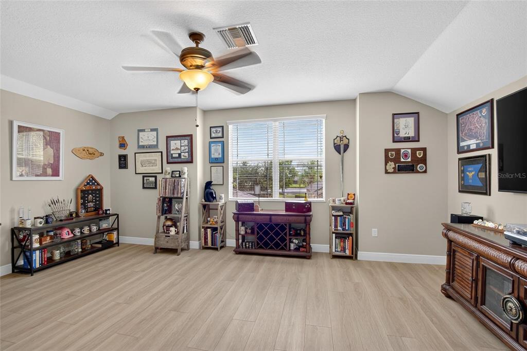 306 Hope Bay Loop Apollo Beach, FL 33572 - Photo 28 of 53 a living room with furniture and a window