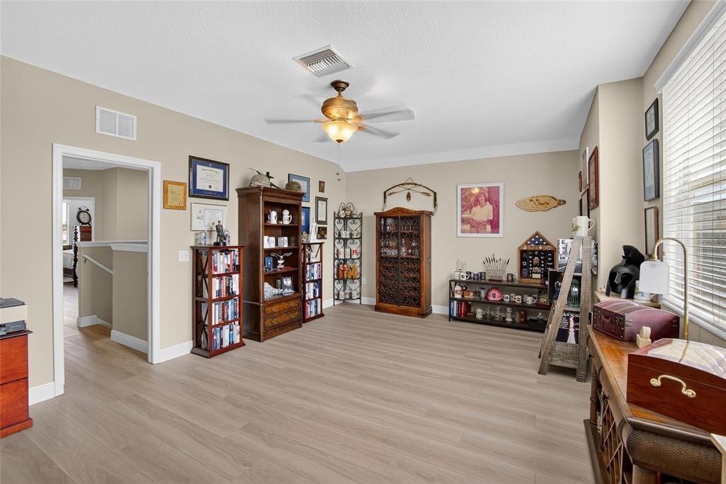 306 Hope Bay Loop Apollo Beach, FL 33572 - Photo 29 of 53 a view of a livingroom with furniture and toys