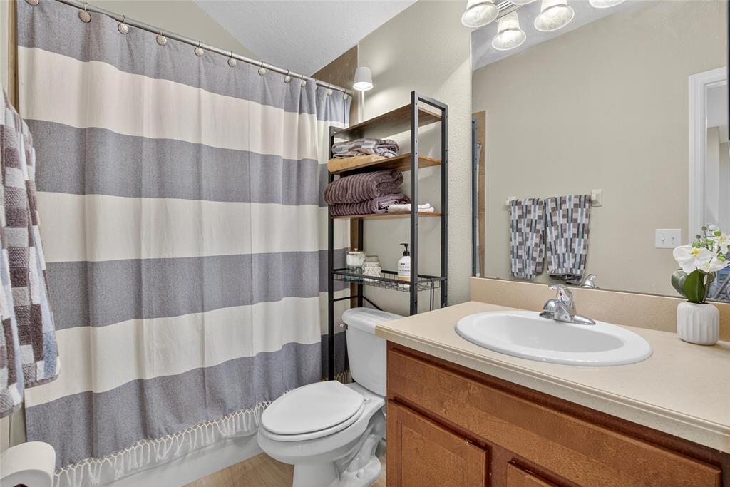 306 Hope Bay Loop Apollo Beach, FL 33572 - Photo 32 of 53 a bathroom with a sink toilet and shower