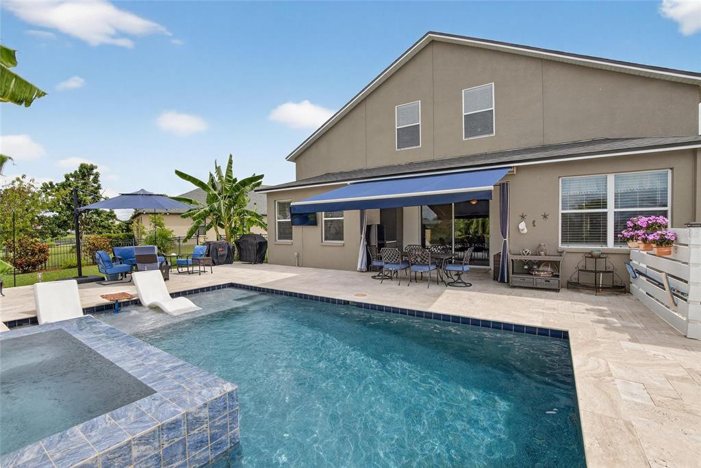 306 Hope Bay Loop Apollo Beach, FL 33572 - Photo 39 of 53 a view of a house with swimming pool and sitting area