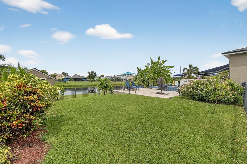 306 Hope Bay Loop Apollo Beach, FL 33572 - Photo 48 of 53 a view of a garden