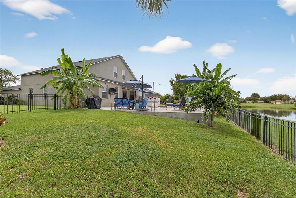 306 Hope Bay Loop Apollo Beach, FL 33572 - Photo 49 of 53 a view of a house with a big yard