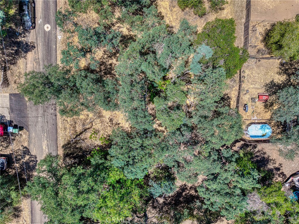 13020 Ridge Street Clearlake, CA 95422 - Photo 16 of 18 an aerial view of a house with a yard