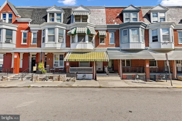 a street view of building with street