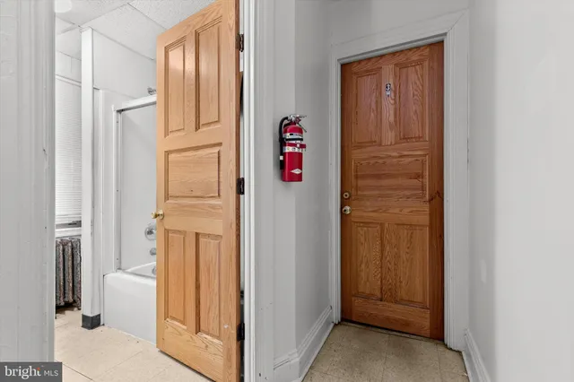a view of hallway with washer and dryer