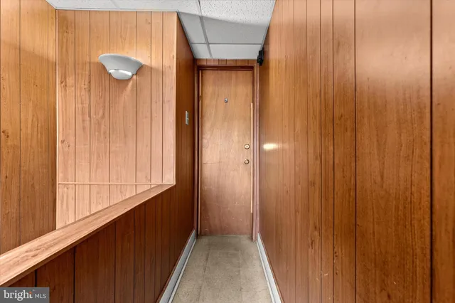 a view of a hallway with closet area