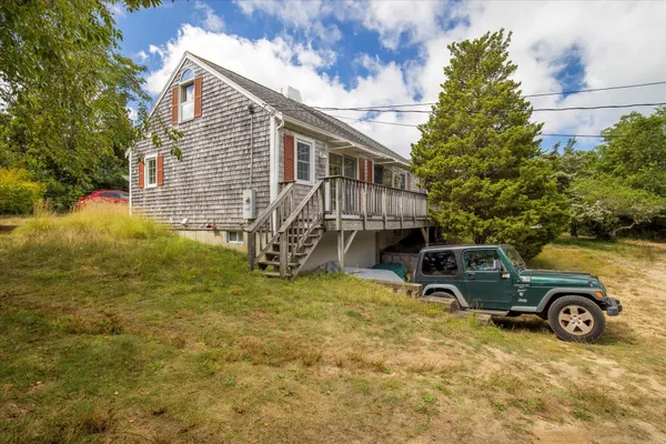 a car parked in front of a house