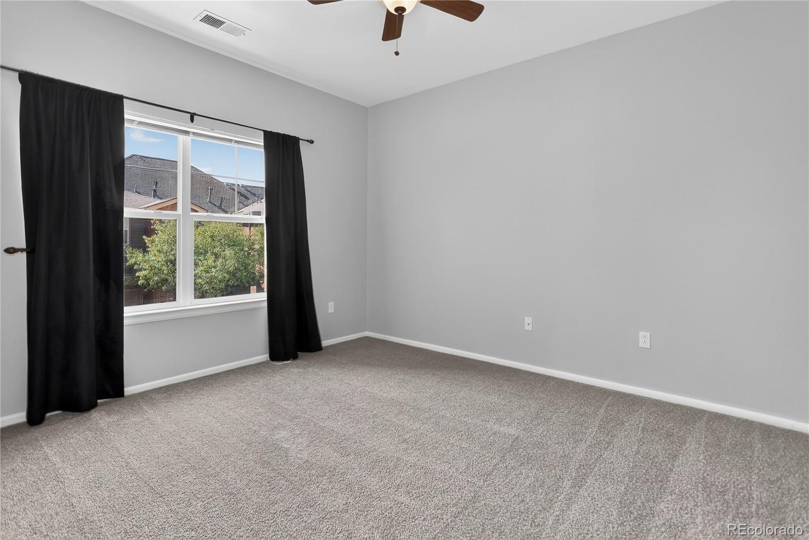9633 East 5th Avenue, Unit 10208 Denver, CO 80230 - Photo 20 of 47 an empty room with a window