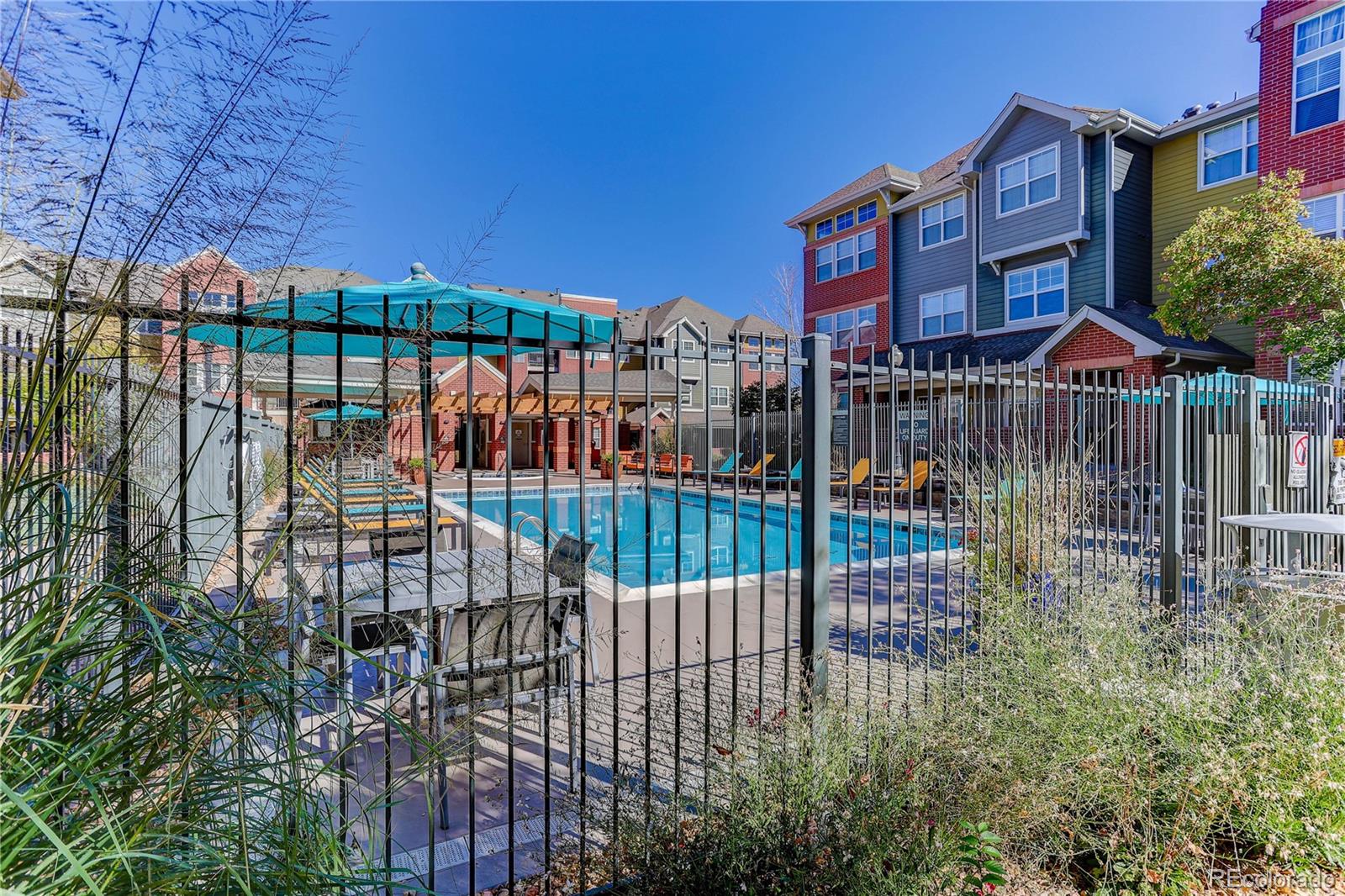 9633 East 5th Avenue, Unit 10208 Denver, CO 80230 - Photo 21 of 47 a view of buildings from the balcony