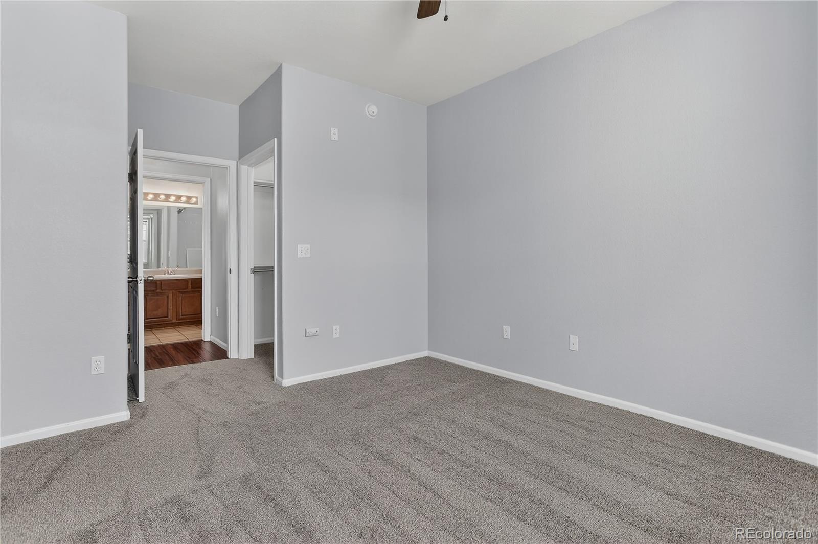 9633 East 5th Avenue, Unit 10208 Denver, CO 80230 - Photo 30 of 47 wooden floor in an empty room