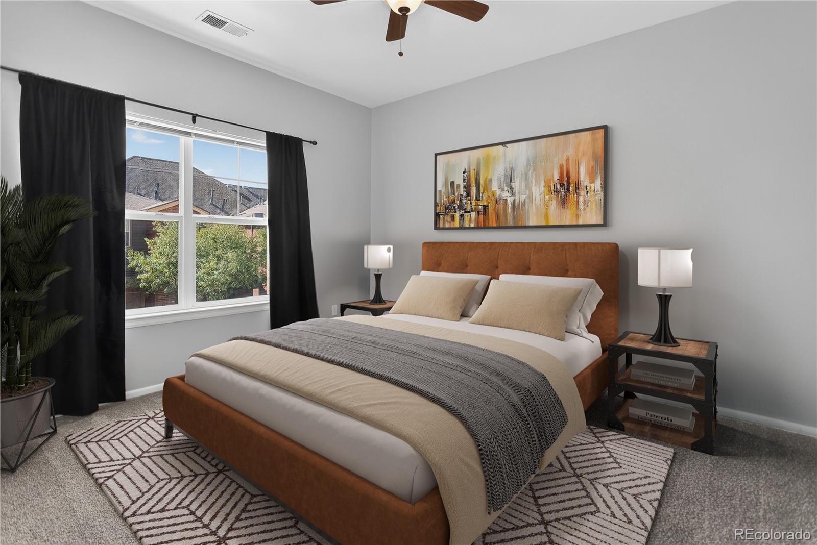 9633 East 5th Avenue, Unit 10208 Denver, CO 80230 - Photo 4 of 47 a bedroom with a large bed and a window