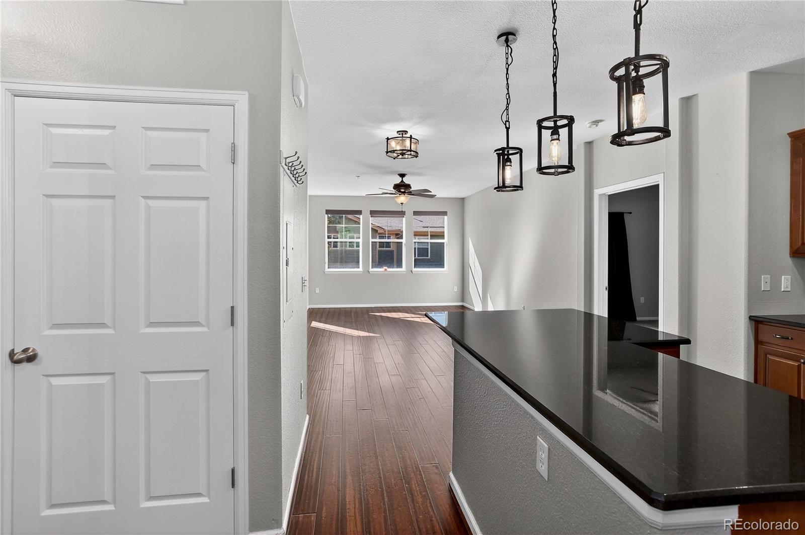 9633 East 5th Avenue, Unit 10208 Denver, CO 80230 - Photo 10 of 47 a view of a kitchen with furniture and a window