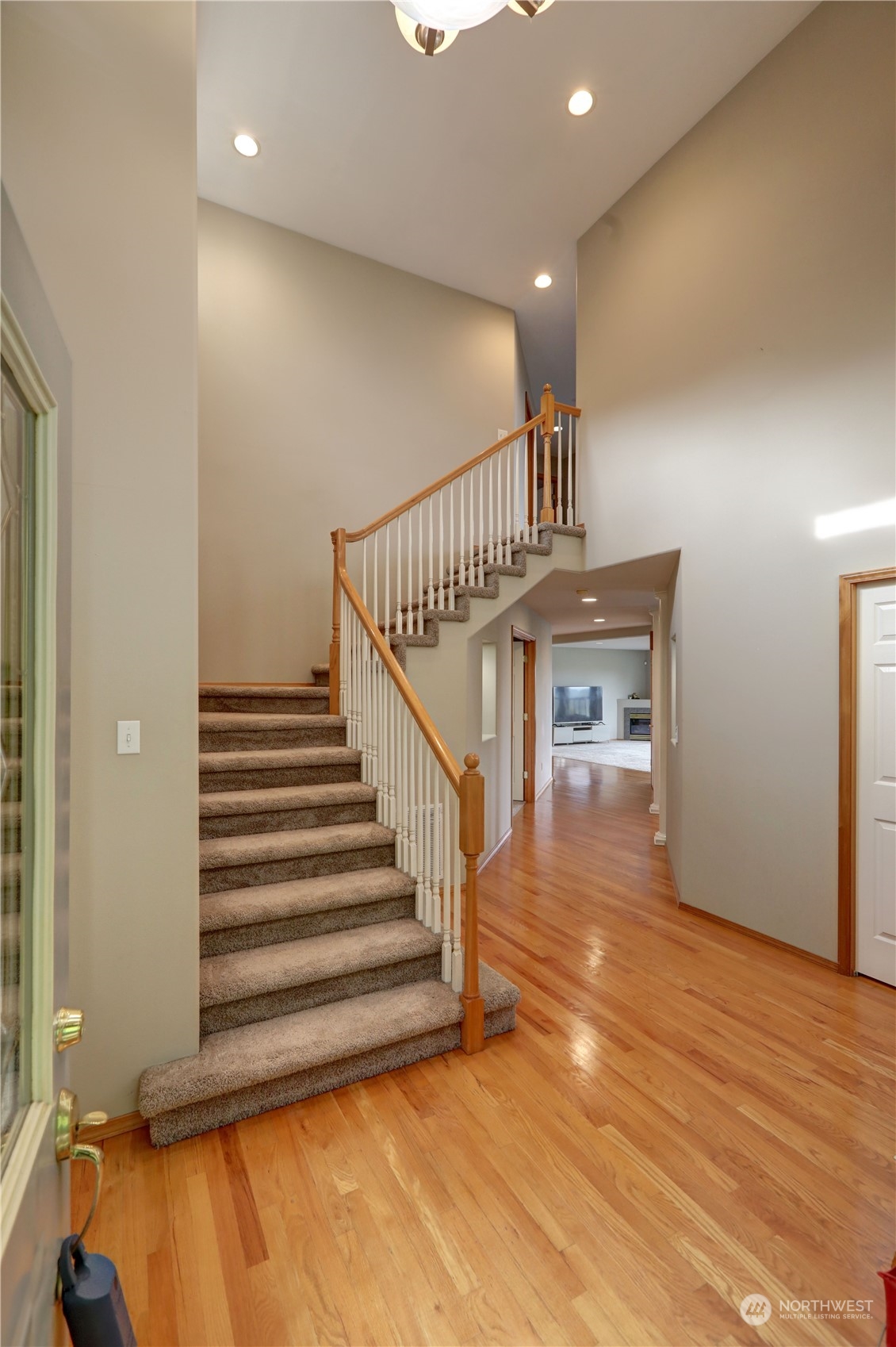 307 Southwest 295th Place Federal Way, WA 98023 - Photo 12 of 25 a view of entryway and hall with wooden floor