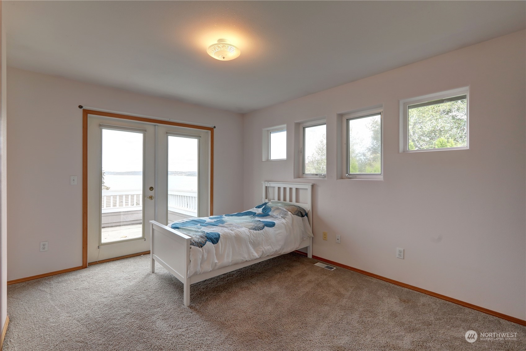 307 Southwest 295th Place Federal Way, WA 98023 - Photo 18 of 25 a bedroom with a bed and window