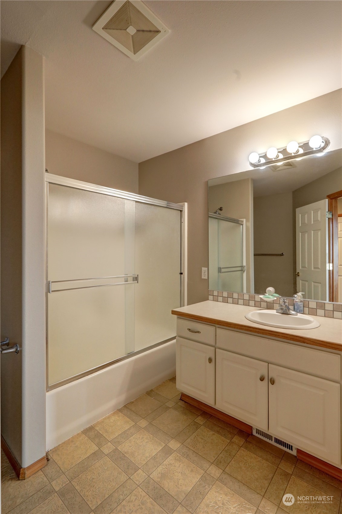 307 Southwest 295th Place Federal Way, WA 98023 - Photo 19 of 25 a bathroom with a sink and mirror
