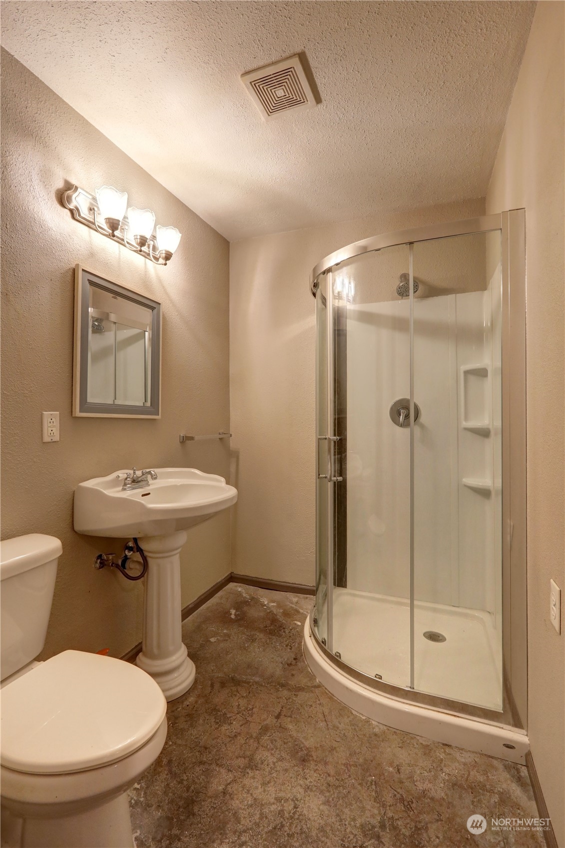 307 Southwest 295th Place Federal Way, WA 98023 - Photo 23 of 25 a bathroom with a sink toilet and shower