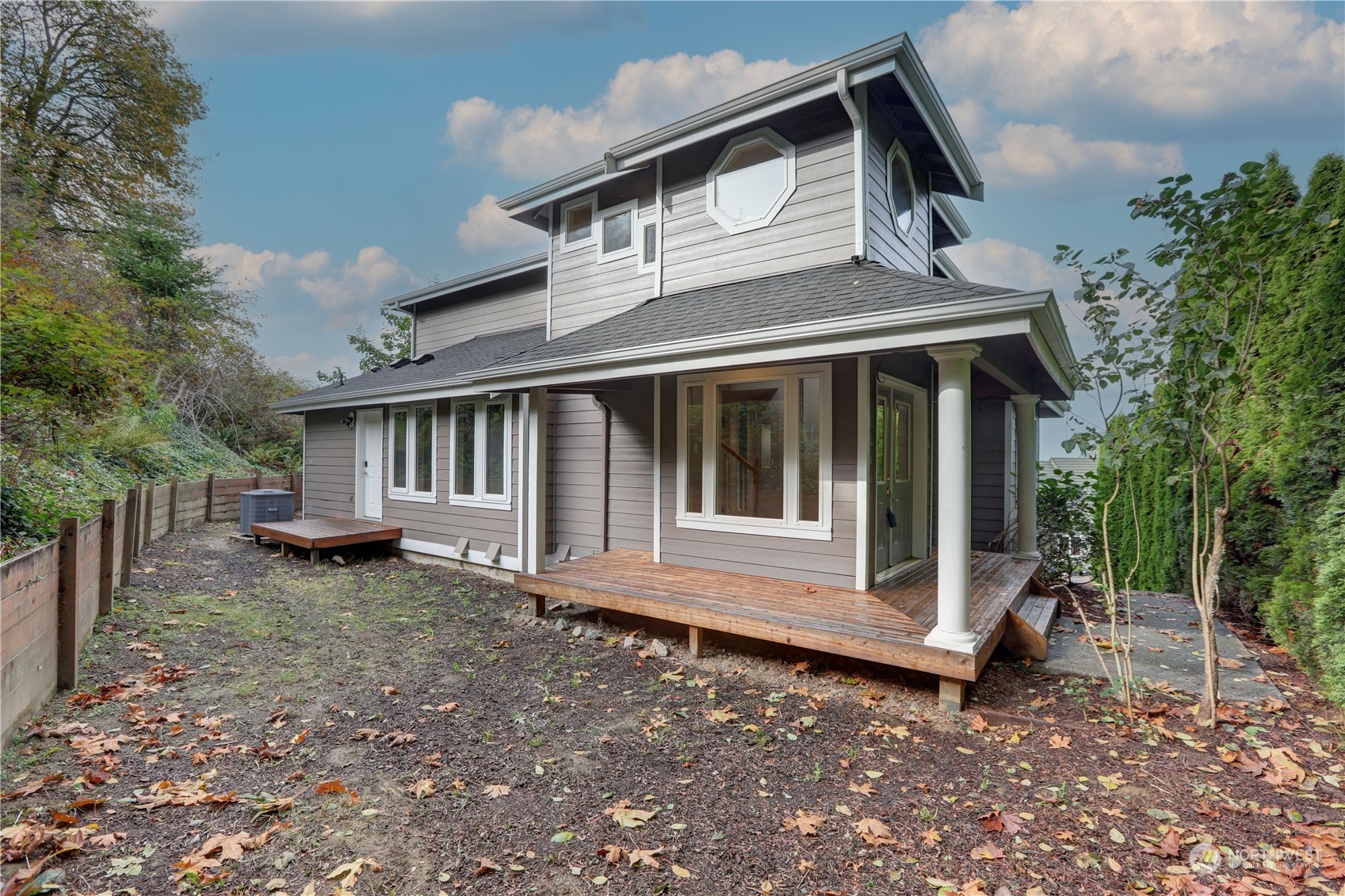 307 Southwest 295th Place Federal Way, WA 98023 - Photo 25 of 25 a view of a house with a yard and wooden fence