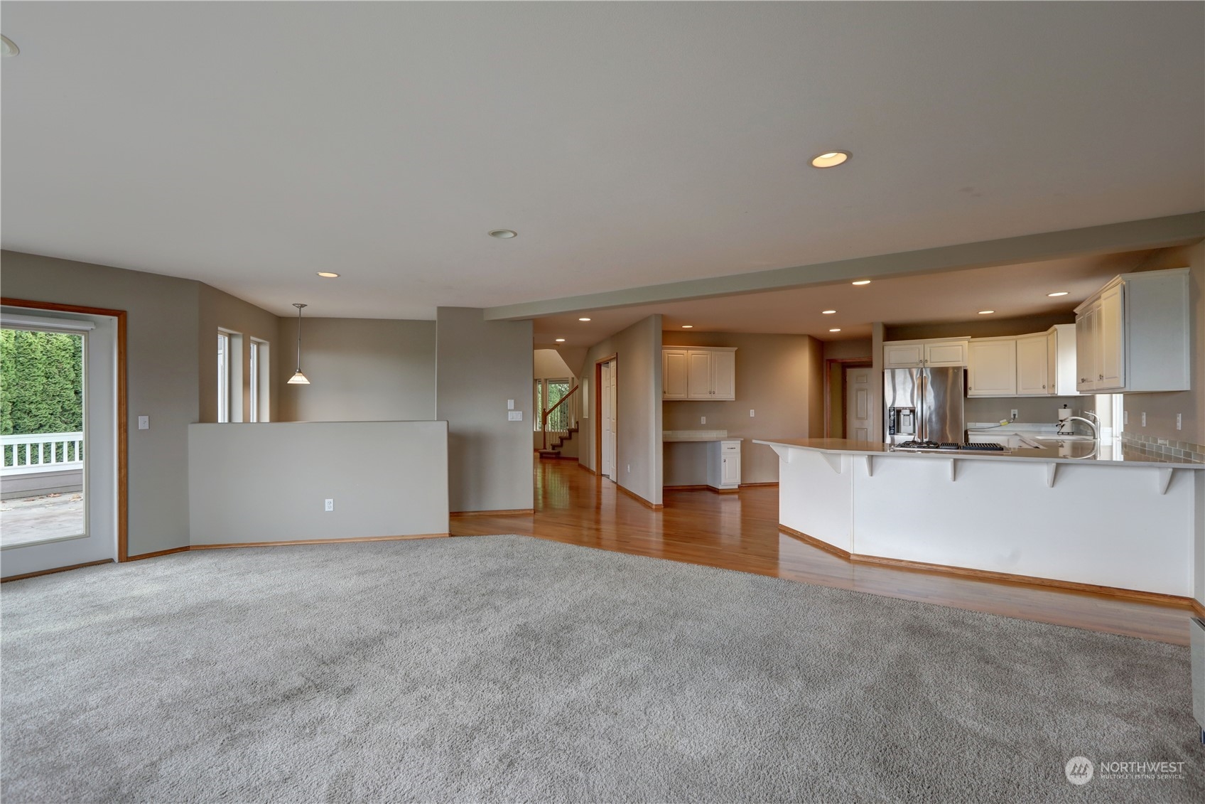 307 Southwest 295th Place Federal Way, WA 98023 - Photo 7 of 25 a view of empty room with kitchen and window
