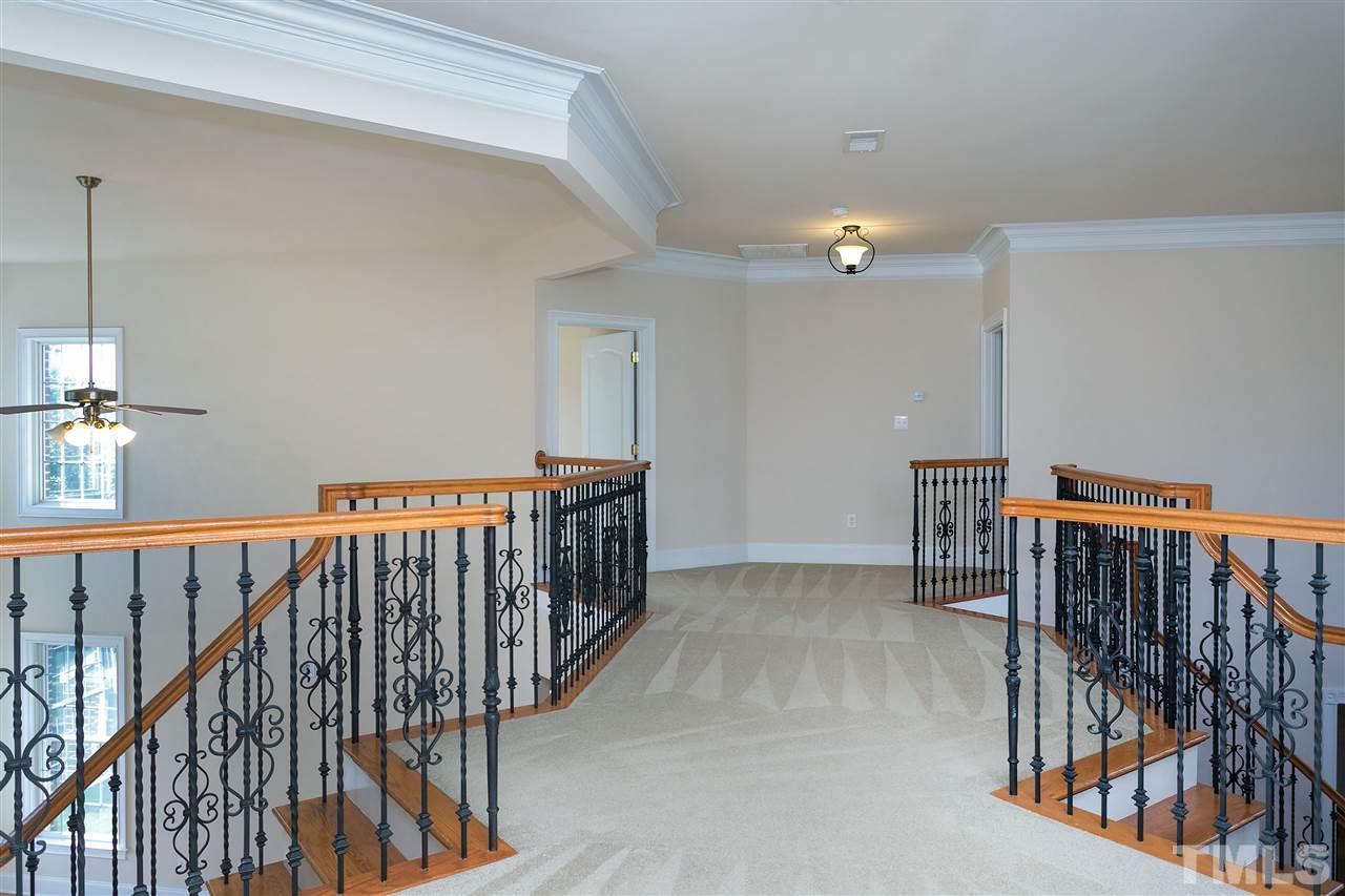9505 Bluemont Court Raleigh, NC 27617 - Photo 14 of 25 a view of hallway with livingroom