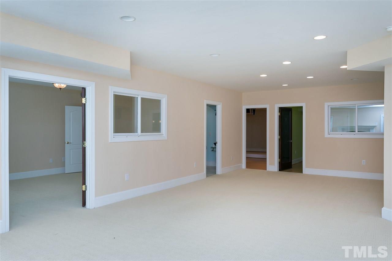 9505 Bluemont Court Raleigh, NC 27617 - Photo 20 of 25 an empty room with closet
