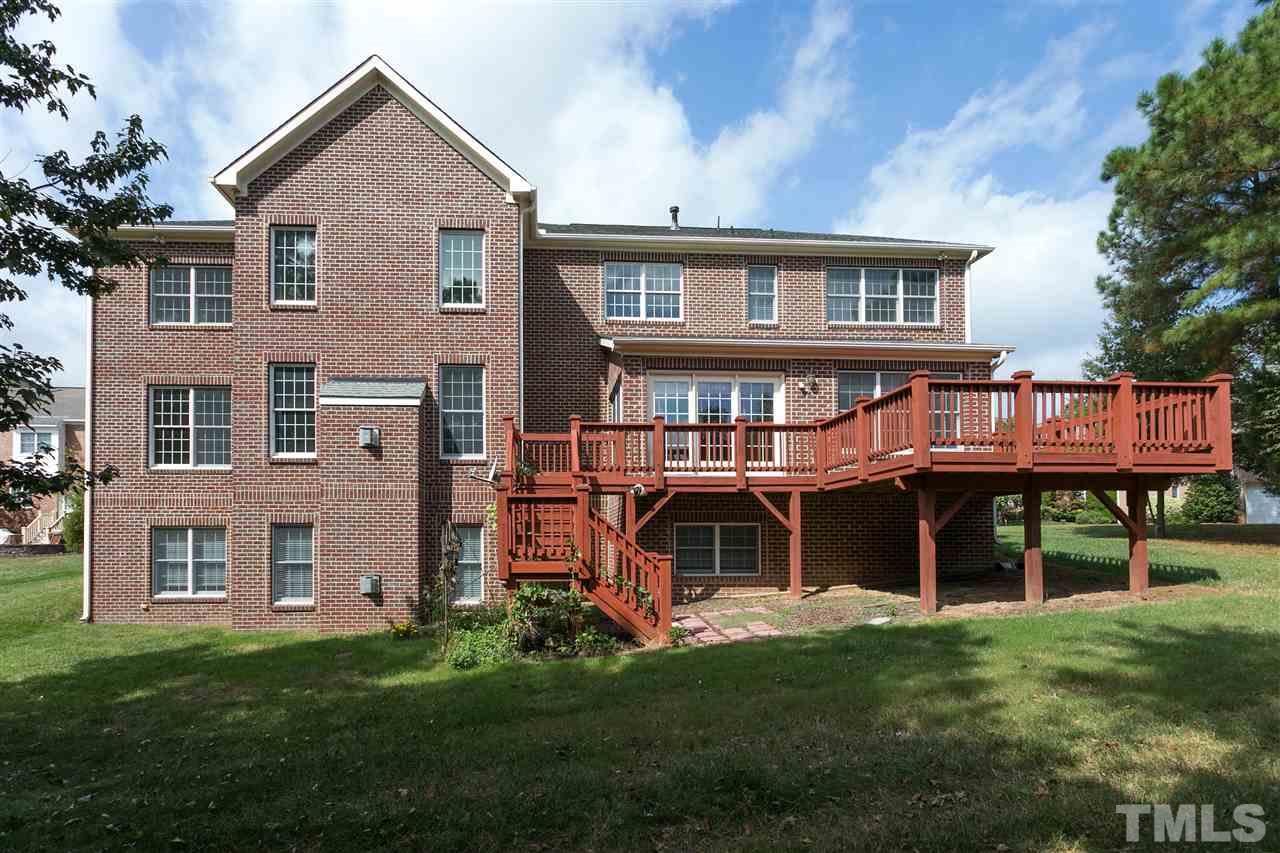 9505 Bluemont Court Raleigh, NC 27617 - Photo 25 of 25 a front view of a house with a garden