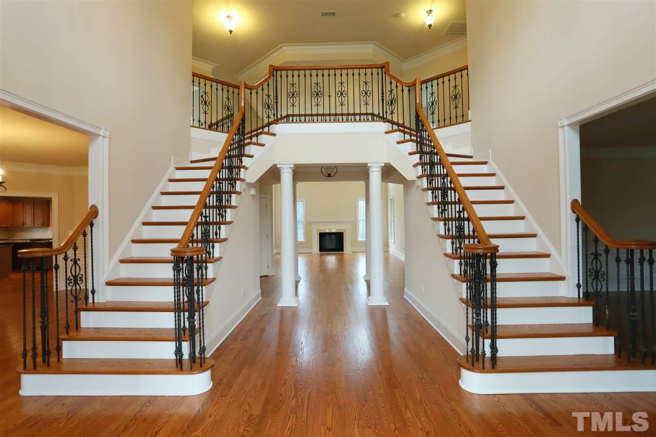 9505 Bluemont Court Raleigh, NC 27617 - Photo 4 of 25 a view of entryway and hall with wooden floor