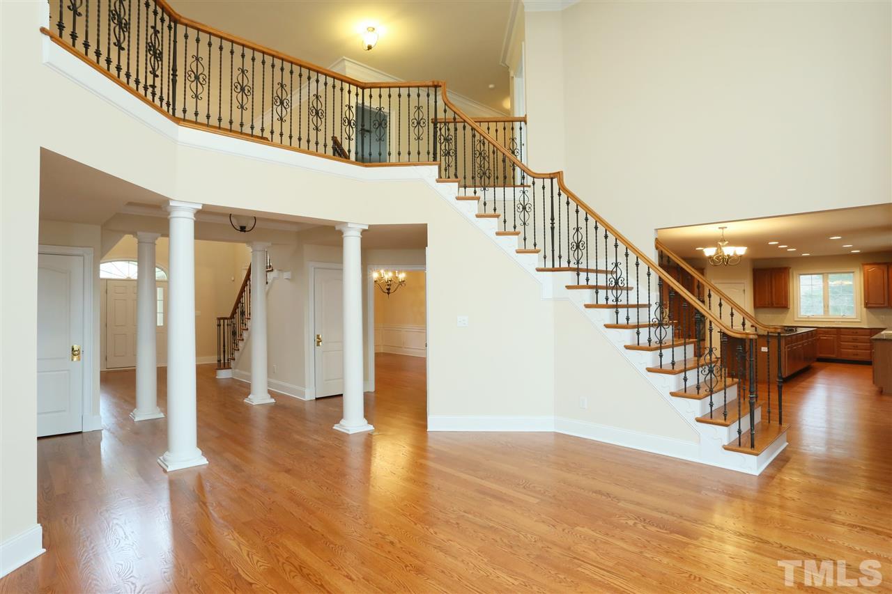 9505 Bluemont Court Raleigh, NC 27617 - Photo 8 of 25 a view of entryway and hall with wooden floor
