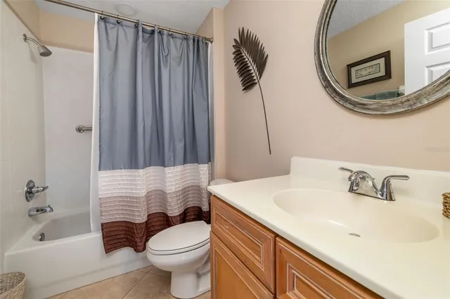 a bedroom with a bed and a closet