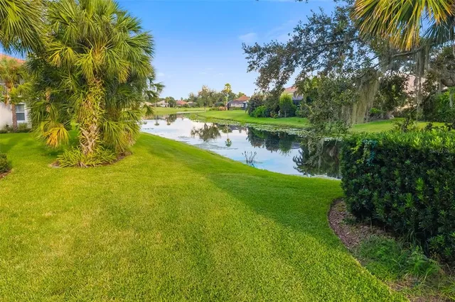 an aerial view of house with yard