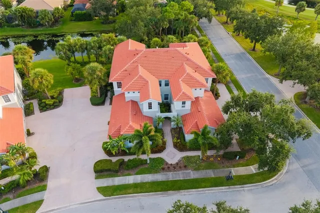 an aerial view of a house with a garden