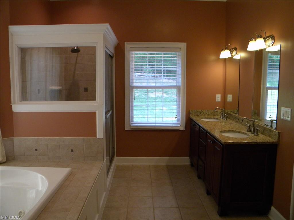 9137 County Line Road Kernersville, NC 27284 - Photo 14 of 28 Main level primary spa bathroom suite