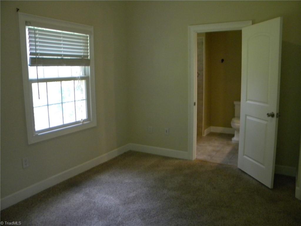 9137 County Line Road Kernersville, NC 27284 - Photo 15 of 28 Main level bedroom 2
