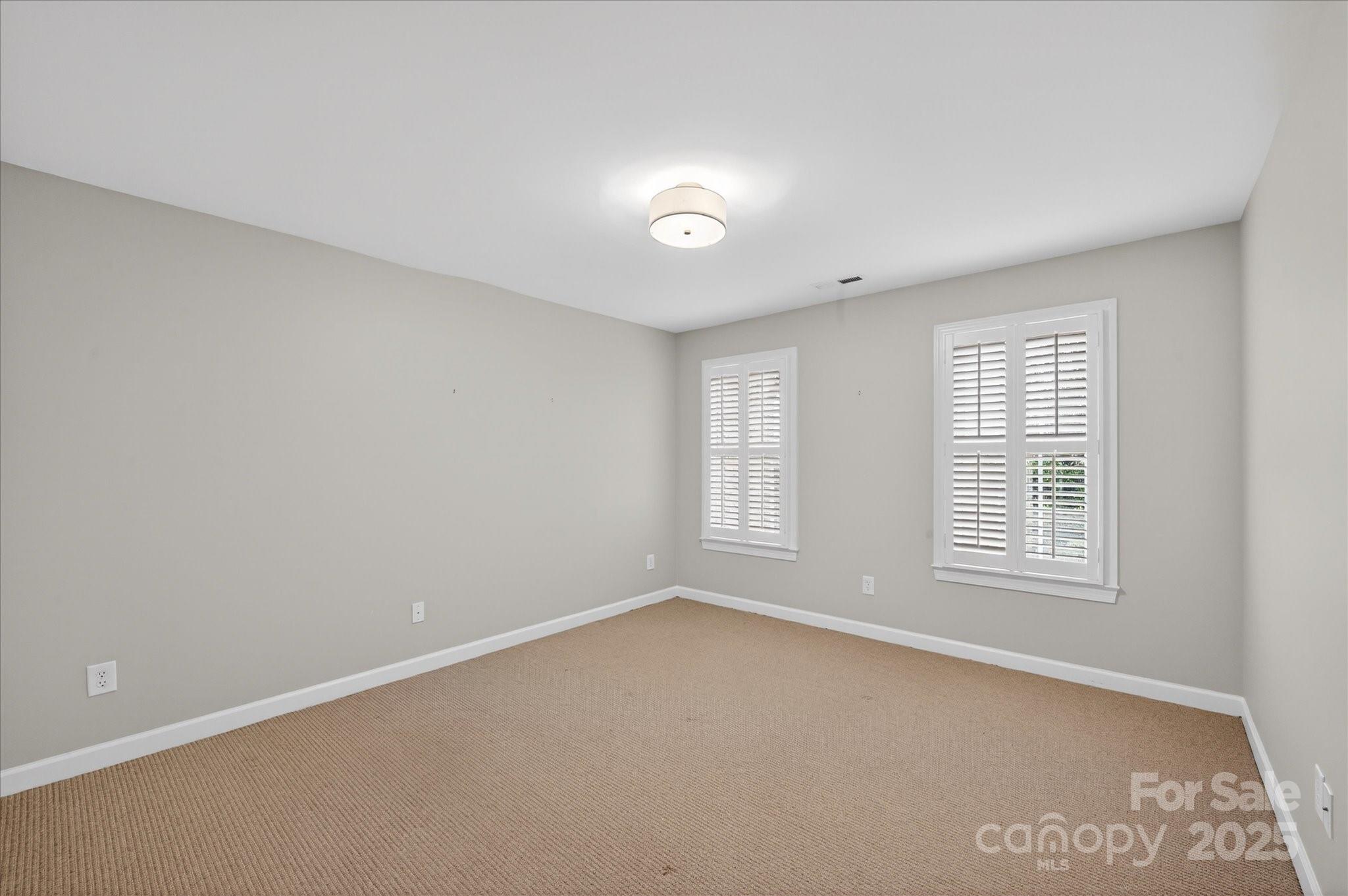 11756 Easthampton Circle Charlotte, NC 28277 - Photo 21 of 35 an empty room with a window