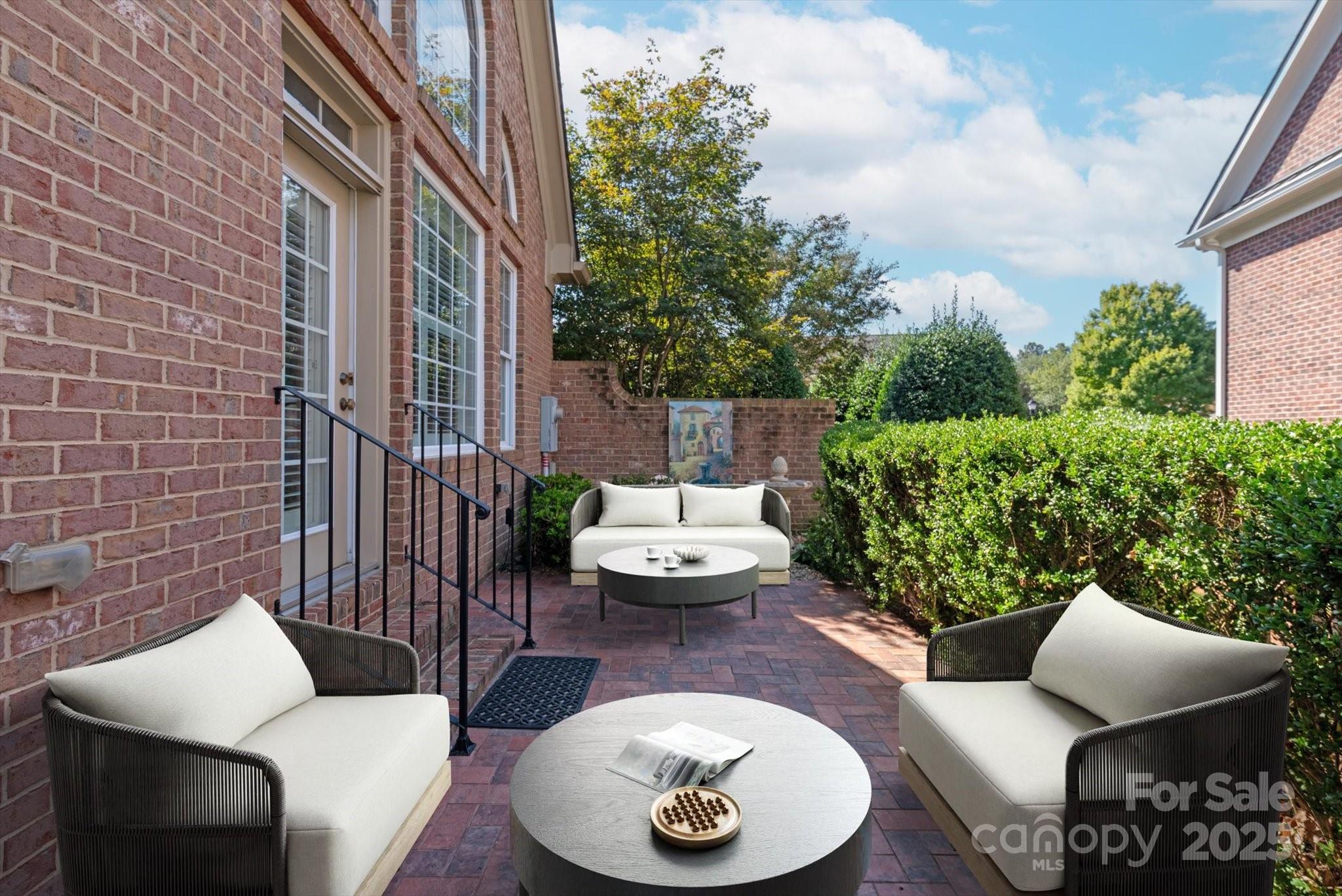 11756 Easthampton Circle Charlotte, NC 28277 - Photo 26 of 35 a outdoor space with patio couches and a potted plant