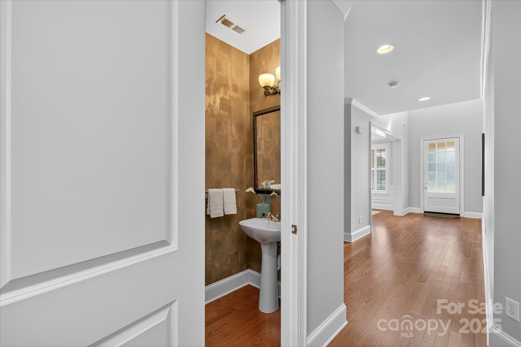 11756 Easthampton Circle Charlotte, NC 28277 - Photo 7 of 35 a view of a hallway with toilet and entryway