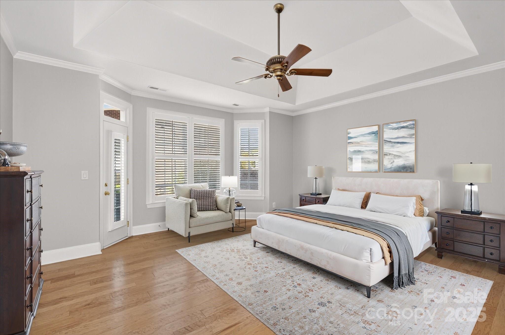 11756 Easthampton Circle Charlotte, NC 28277 - Photo 8 of 35 a spacious bedroom with a large bed and a couch