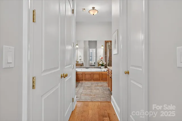 a bathroom with a sink and mirror