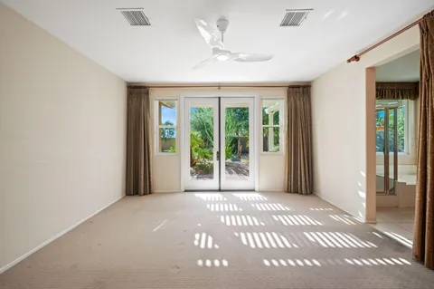 a view of a room with a large window