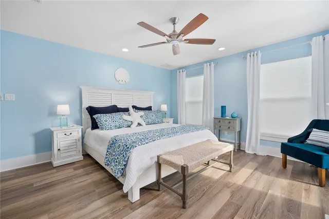 a bedroom with a bed and a table