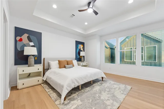 a bedroom with a bed and a dresser