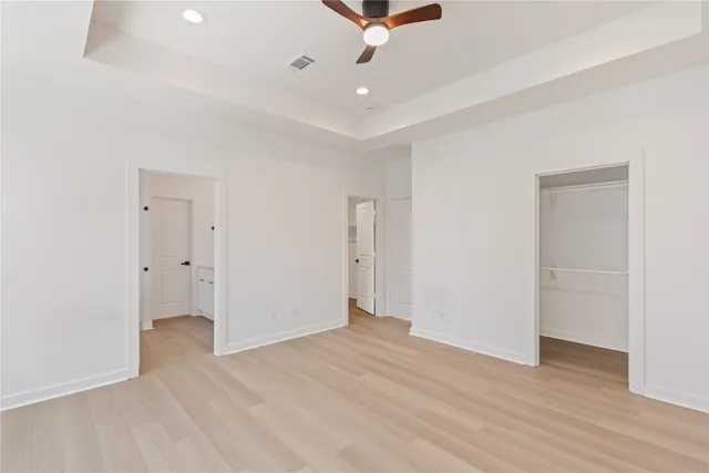 a bathroom with double vanity sink and a mirror