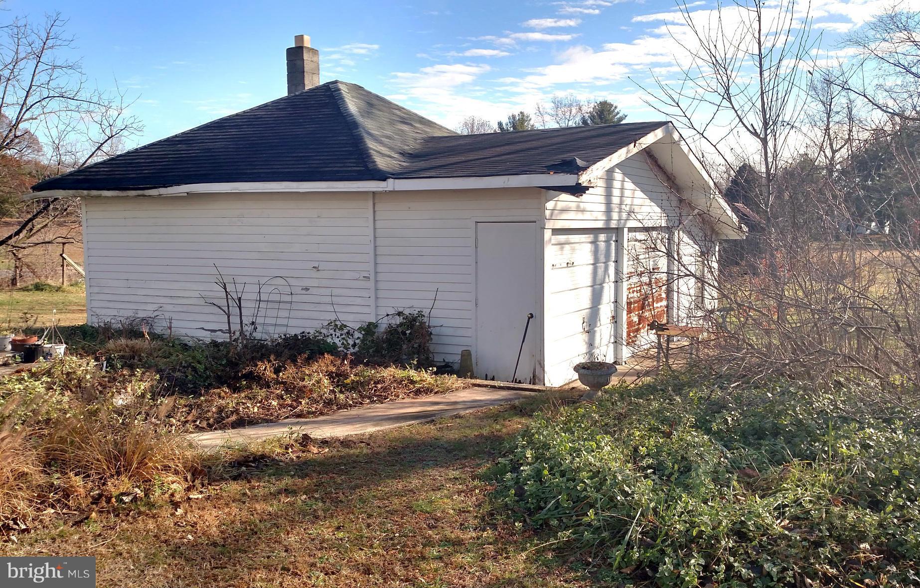 2880 Hallowing Point Road Prince Frederick, MD 20678 - Photo 25 of 30 Garage with Electric, Workshop and added Storage.