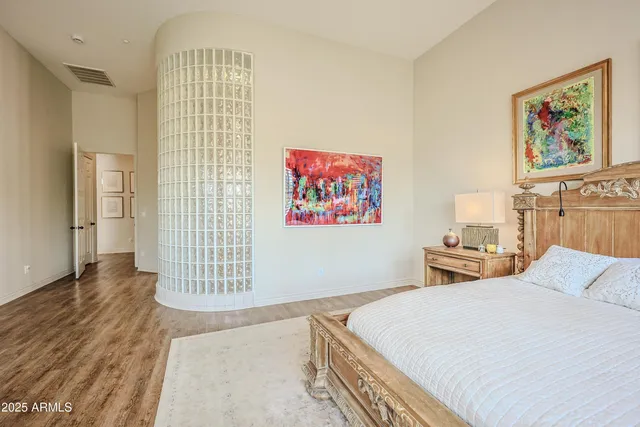 a view of a dining room with furniture wooden floor and chandelier