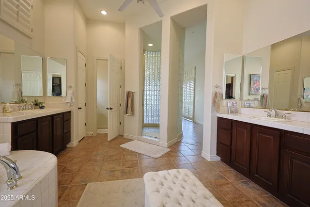 a bedroom with a bed and a cabinets