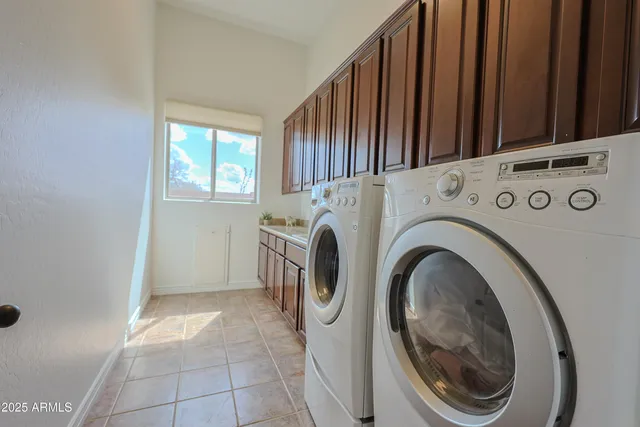a view of a house with a yard porch and furniture