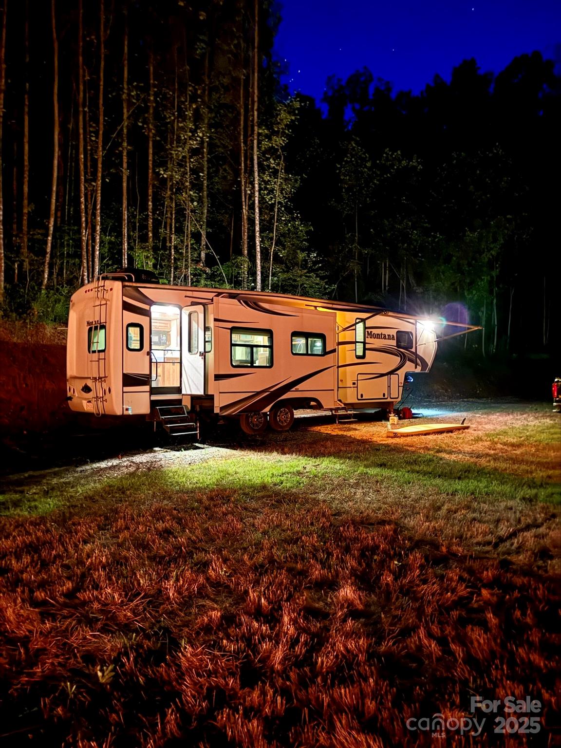 7042 Yellow Creek Road Robbinsville, NC 28771 - Photo 11 of 18 a view of a house with a yard
