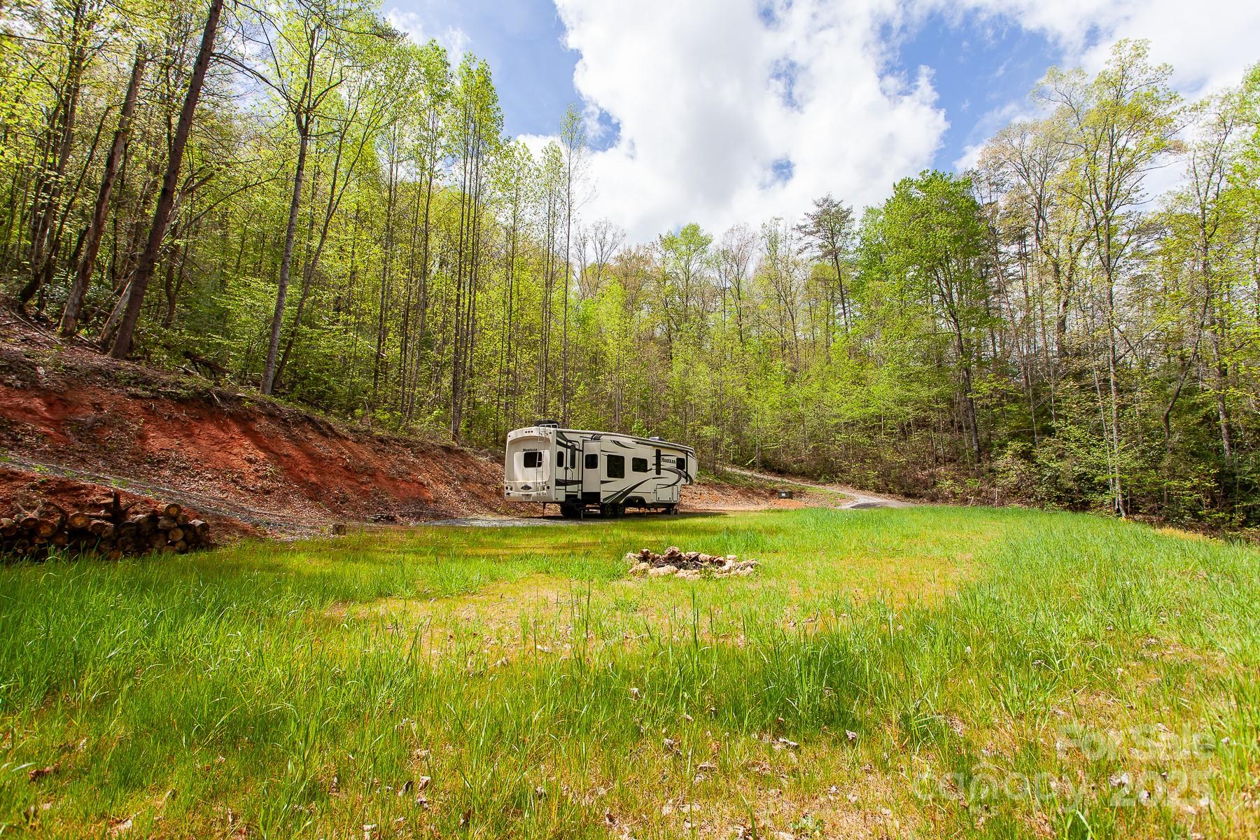 7042 Yellow Creek Road Robbinsville, NC 28771 - Photo 7 of 18 a view of a golf course with a yard